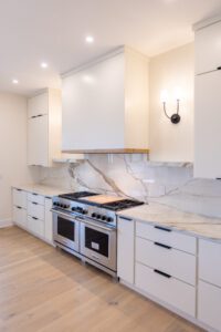 A modern kitchen with white interiors